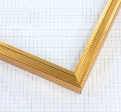 This 3/4 " profile frame features a Thin Stem Classic frame design finished in genuine gold leaf. Its sleek, refined contours and subtle antique accents create a timeless, elegant look ideal for highlighting fine art, photography, or classic décor pieces.